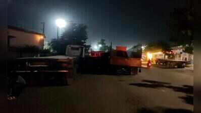 Trucks parked along Kanakpura Road choke traffic near Gokulpura Phatak