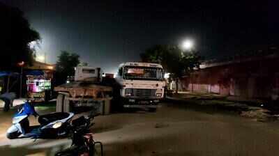 Trucks parked along Kanakpura Road choke traffic near Gokulpura Phatak