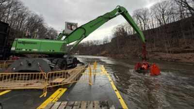 Crews are removing over 850,000 cubic yards of toxic sediment from Ohio's Cuyahoga River; the waste is being stabilised two miles downstream