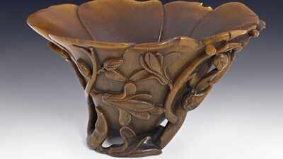 A Sydney shopper bought a carved cup for A$4 at a thrift shop; experts identified it as a centuries-old Chinese rhinoceros-horn cup, and was auctioned for A$75,640 in 2013