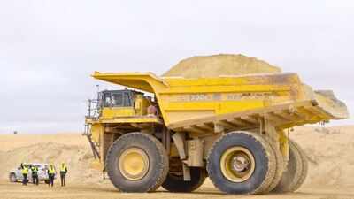 A Moroccan mine built a heavy-truck road from phosphate waste rock; field tests cut dust emissions by 91%