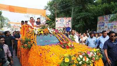 Uttarakhand CM Dhami, Union ministers Kiren Rijiju and Jual Oram lead massive roadshow, attend 'Aadi Rangotsav Festival' in Khatima