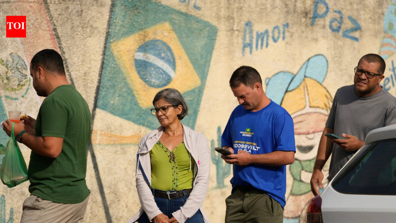 Brazil election: Lula, Flavio Bolsonaro head to runoff after tight first-round vote