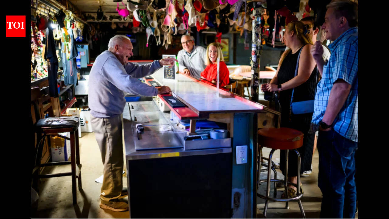 A 103-year-old World War II veteran has been tending the same basement bar in Maryland since 1963