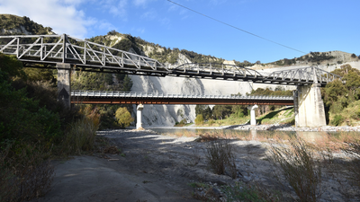 New Zealand replaced this 1904 bridge with a modern crossing after 112 years; locals saved the historic structure, now the country’s only surviving steel cantilever road bridge