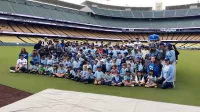 Will Smith brought 130 students from a school destroyed by the 2025 Palisades wildfire to Dodger Stadium; his foundation turned the day into a STEM and sports programme