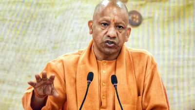 CM Yogi Adityanath hails PM Modi on 25 years as head of govt, says he presented Gujarat as model State