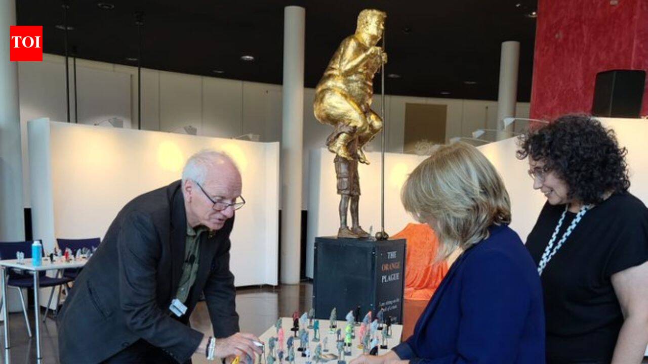 Trump as ‘orange plague’: Gold-covered naked statue of US president unveiled at European Parliament