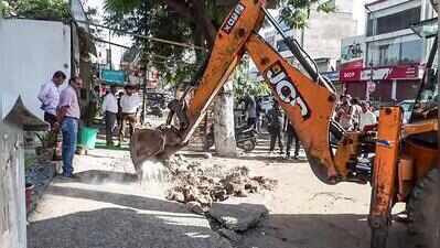 PMC demolishes illegal construction on land reserved for playground in Kharadi