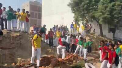 Students take to streets as ‘land sharks’ try to grab school land in Dankaur