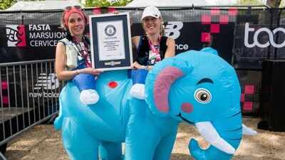 Two runners completed the London Marathon inside one giant inflatable elephant in 4:15:40; they set a world record while raising money for type 1 diabetes