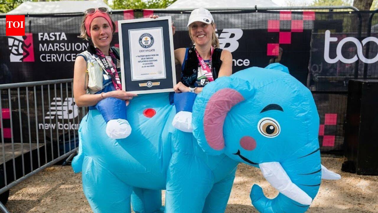 Two runners set a world record in a giant inflatable elephant at the London Marathon