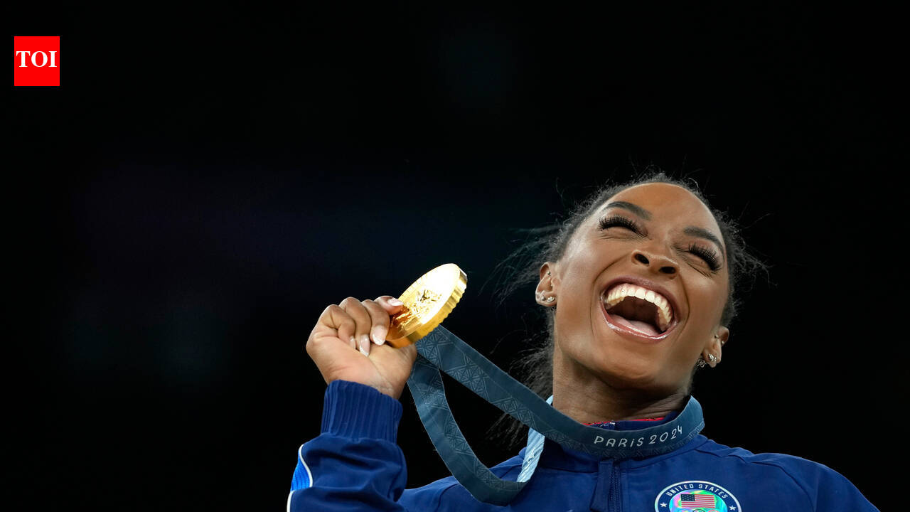 Simone Biles reflects on her family and the grandparents who adopted her