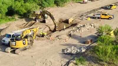 In 1951, a Texas town of 400 residents avoided condemnation for a federal dam; 75 years later, a 90-year-old landowner and his neighbors have temporarily halted a 30-foot border wall on the same riverfront
