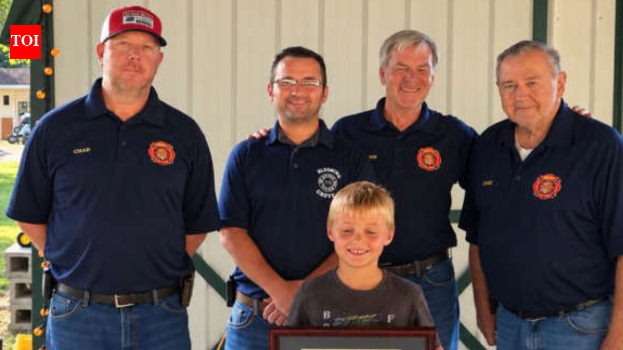 Boy Honoured For Fire Alert: Carter Hicks spots smoking trailer; fire crew hails his quick action