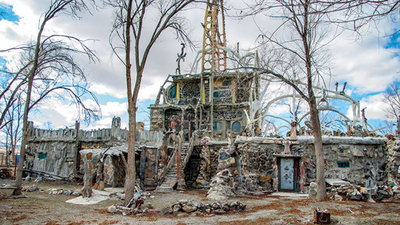 In 1969, a Nevada man began turning roadside junk, bottles, hubcaps and car parts into a desert home; decades later, the five-acre Thunder Mountain Monument is a free roadside attraction