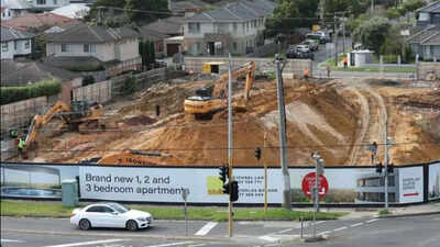 An Australian developer says a rail project halted its 218-apartment build after the state moved to acquire underground land; with more than 100 buyers waiting, it is suing for at least A$100 million