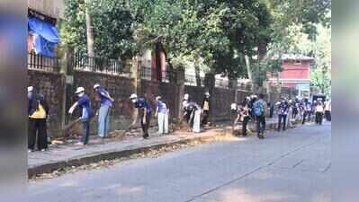 Gen Z participate in cleaning Railway Station Road