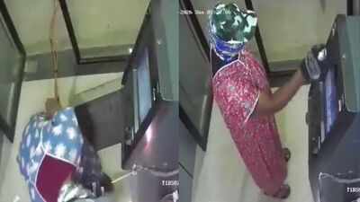Watch: Men in nighties, masks loot SBI ATM in Telangana; Rs 25 lakh suspected stolen