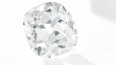 Woman who bought a £10 ring at a London flea market and wore it for decades saw its 26.27-carat diamond sell for £656,750