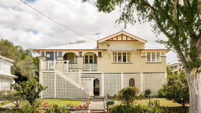 In 1921, a Brisbane man built a family home that stayed with his descendants for 105 years; his 98-year-old daughter has now sold the 810-sq-m property for A $2.03 million after 10 bidders registered