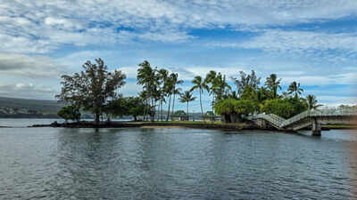 Nearly four years after engineers rated Coconut Island’s only pedestrian bridge in serious condition, an 8,000-pound county excavator helped collapse it; Hawaii now faces up to $22 million to restore access