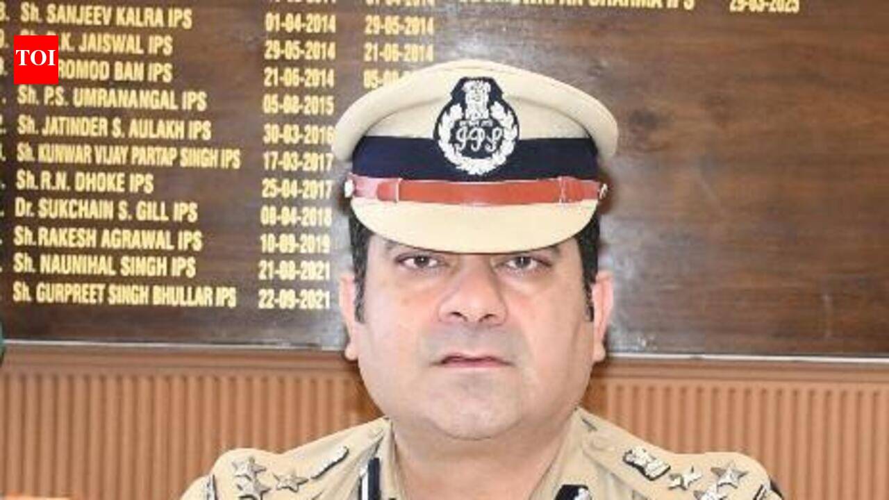 Enforcement Directorate summons document overlaid on a blurred image of a police commissioner, with subtle AI-related digital elements in the background.