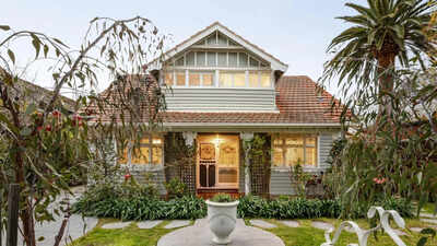 A 1920s Arts and Crafts home in Melbourne's Alphington heads to auction for $3.4 million; the historic home comes with Kookaburra stained-glass windows and distinctive architectural features