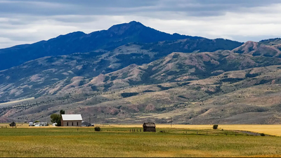 An Iowa farmer whose family farms 400 acres says crops barely cover taxes; after a solar project won a key county permit, he says leases are running about $1,200 per acre and hopes most of his land can join
