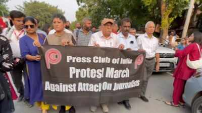 Journalists march against detention, assault during protests over electoral rolls