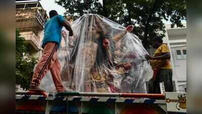 Met office assures no dampening of festivities, puja clubs all set to repel rain effect
