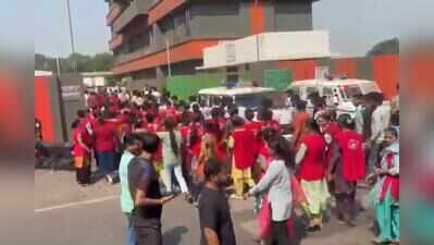 Pocket pressures: Women workers halt work