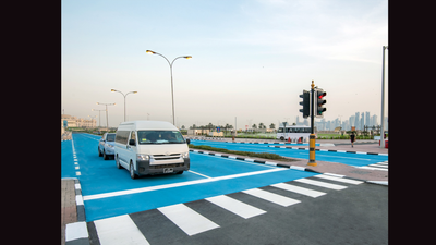 Qatar painted sections of its roads blue to fight extreme heat; the 2019 pilot tested a coating designed to reflect 50% of sunlight
