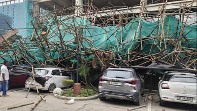 Shuttering collapses from 7th floor of construction site amid strong winds; 14 cars crushed in Noida