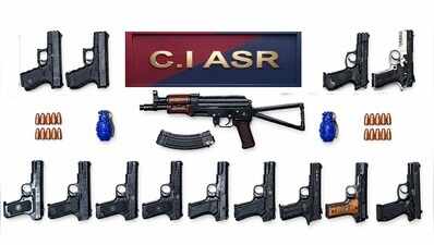 Father-son duo among five held with assault rifle, 13 pistols