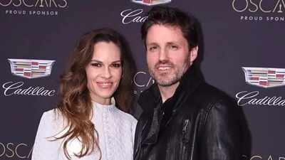 Hilary Swank shows off baby bump after pregnancy announcement; 52-year-old expecting third child with husband Philip Schneider