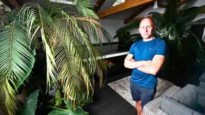 UK dad spent £80,000 building an 80-square-metre tropical garden hideout with an 8,000-litre fish tank, 14 koi fish and 15 geckos