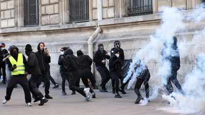 Tear gas fired as thousands protest rising cost of living across France