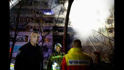 Woman killed, 3 injured as Russian attack hits Kyiv residential building, subway station