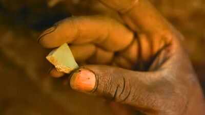 A tiny green pottery shard links Great Zimbabwe to China; glass beads reveal the medieval African city's far-reaching trade networks