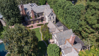 A Beverly Hills mansion once owned by Warner Bros. co-founder Harry Warner was restored with its Old Hollywood details intact; first listed for nearly $40 million in 2016, it finally sold for $27.25 million