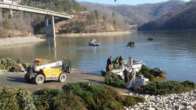 Kentucky collected about 5,000 discarded Christmas trees in 2026 instead of sending them to landfills; officials sank 1,700 in a single lake to replace lost underwater shelter for fish