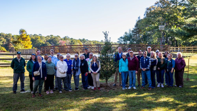 Delaware marked its state parks' 75th anniversary by planting its 75,000th tree, completing a five-year goal across 17 parks while a broader program aims for one million new trees by 2030