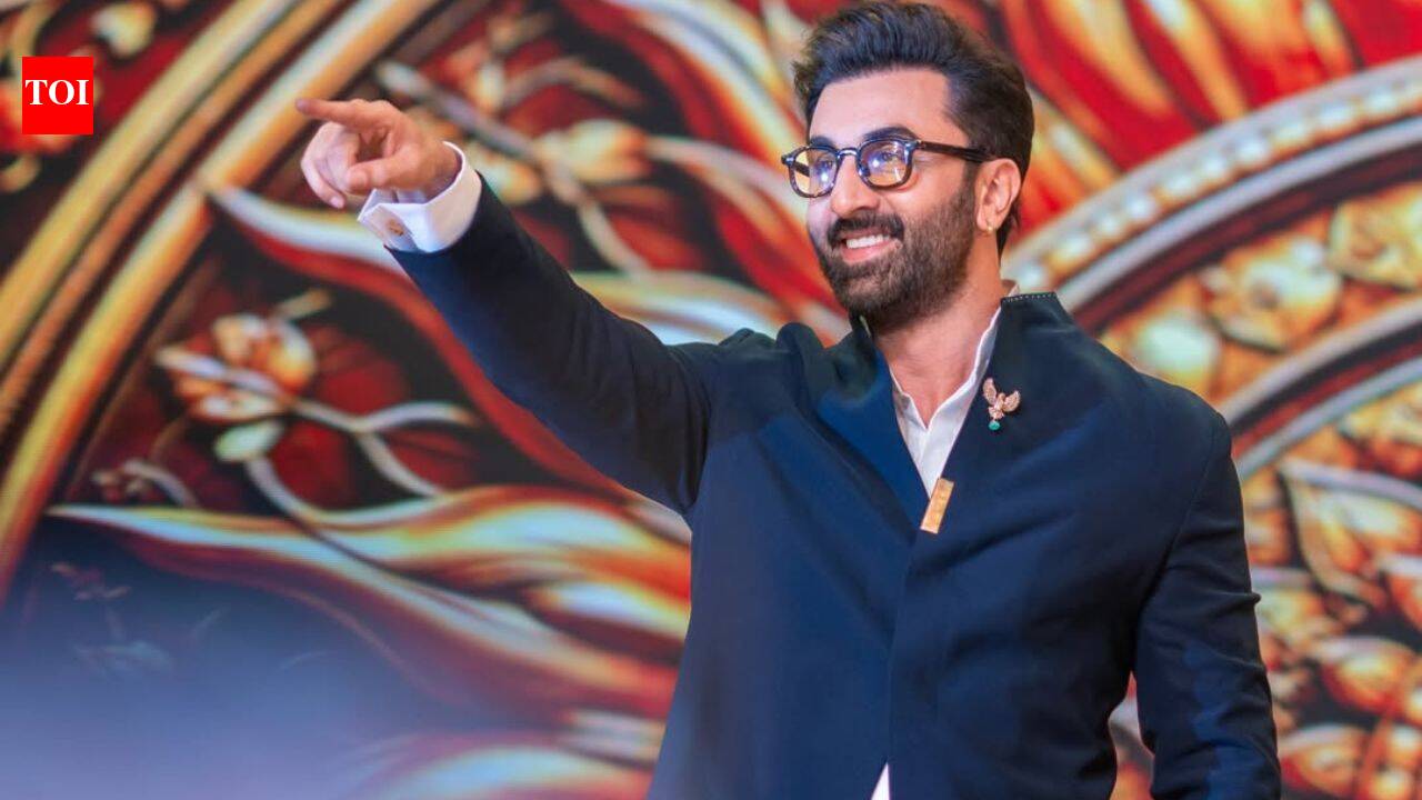 Ranbir Kapoor pairs Rs 95k navy Bandhgala with a stunning emerald brooch