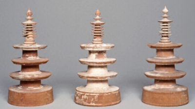 Around 770 CE, a Japanese empress ordered one million miniature Buddhist pagodas containing printed prayers; one survived for over 1,250 years and sold for $40,960, nearly 2.8 times its highest estimate