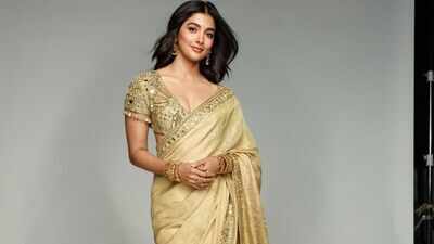 Pooja Hegde serves timeless ethnic elegance in a beige gold tissue silk saree worth Rs 1.91 lakh