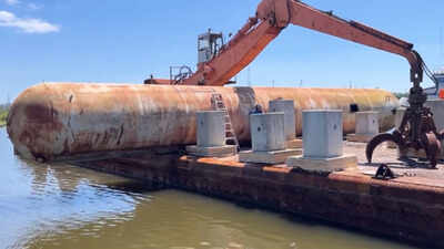 Mississippi sank a 31-ton propane tank and steel tower once used to train firefighters 13 miles offshore, turning old equipment into a long-lasting artificial reef for Gulf fish