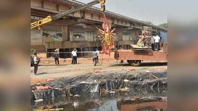 Capital bids farewell to Durga idols with green immersion