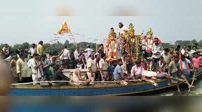 Devotees hold Durga idol immersion boat procession in Rajnagar