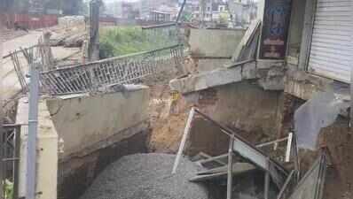 Road caves in during creek bridge construction